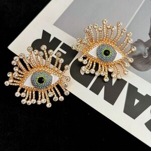 Elegant Gold and Blue Eye Earrings